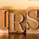 IRS tax scams: Letters on a desk.